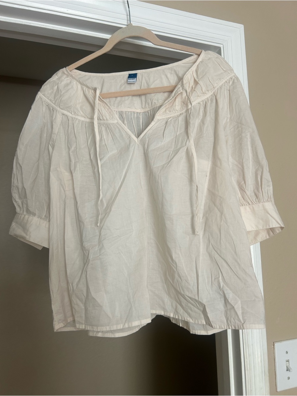 Old navy- peasant Blouse with Tie Neck and tie arms. Ivory